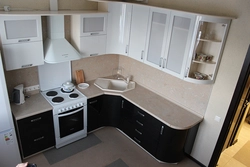 Photo of a corner kitchen in a small apartment