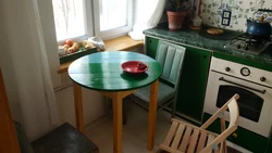 Round table photo in the kitchen in Khrushchev photo