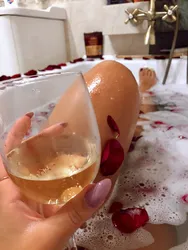 Glass of champagne photo in the bath