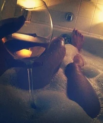 Glass of champagne photo in the bath