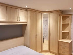 Small Bedroom Design With Corner Wardrobe