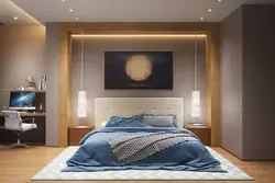 Light above the bed in the bedroom photo