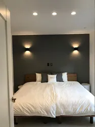 Light Above The Bed In The Bedroom Photo