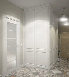 White wardrobe in the hallway in the interior