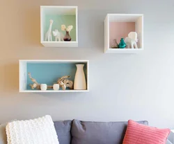 Shelves on the wall in the bedroom interior
