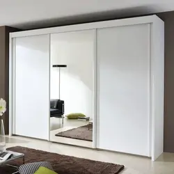 White Wardrobe In The Living Room Interior