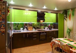 Kitchen design with green wallpaper