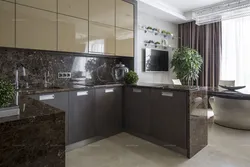 Brown kitchen with white countertops in the interior