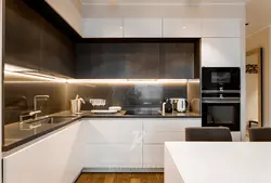 Brown Kitchen With White Countertops In The Interior