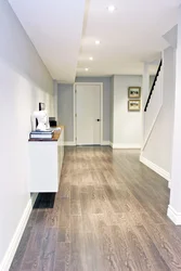 Laminate flooring in the kitchen and hallway photo