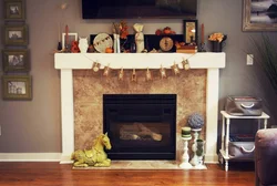 Decor for the fireplace in the living room interior