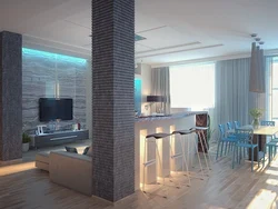 Columns in the interior of a living room with a kitchen