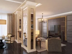 Columns in the interior of a living room with a kitchen