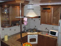 Угловая кухня с плитой в углу фото