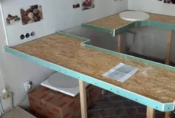 Do-it-yourself table from a countertop for the kitchen photo