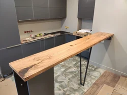 Do-it-yourself table from a countertop for the kitchen photo