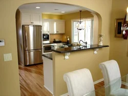 Kitchens with arches and bar counters photo