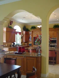 Kitchens with arches and bar counters photo