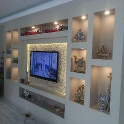 Plasterboard shelves in the living room all photos