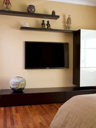 Дизайн спальни с тумбой под телевизор