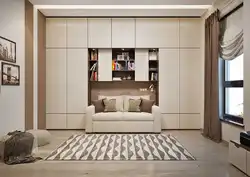 Living room design with wall-to-wall sofa