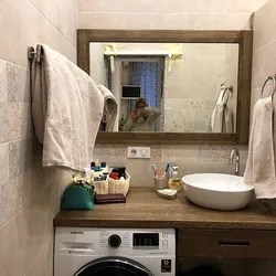Bathroom Design With Countertop Sink And Washing Machine