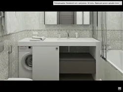 Bathroom design with countertop sink and washing machine