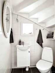 Bathroom design under the stairs in the house