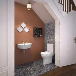 Bathroom design under the stairs in the house