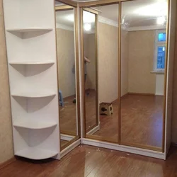 Corner Wardrobe With Drawers In The Bedroom Photo