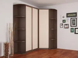 Corner wardrobe with drawers in the bedroom photo