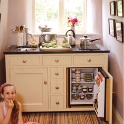 Kitchen with mini refrigerator photo