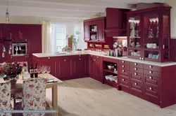 Wallpaper in the interior of a burgundy kitchen