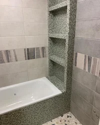 Bathroom built into a niche photo