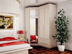 Bedrooms for a small room with a corner wardrobe photo