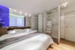 Bedroom interior with balcony and dressing room