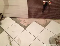 How to tile a bathroom floor photo