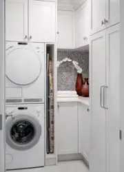 Washing machine drying machine in the bathroom interior