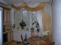 Curtains for the kitchen with a balcony door in a modern style photo