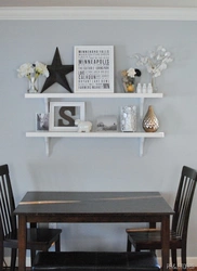 Shelves in the kitchen above the table in the interior