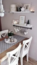 Shelves in the kitchen above the table in the interior