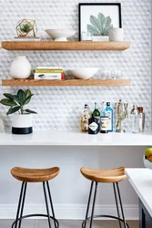 Shelves in the kitchen above the table in the interior