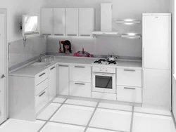 Белая кухня с белой столешницей и белой техникой фото
