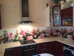 Wallpaper with roses in the kitchen interior