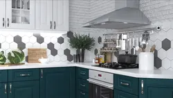 Photo of a kitchen with a gray stove