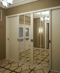 Compartment doors in the hallway interior photo