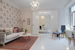 Living room design in light colors combined wallpaper