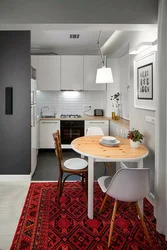 Modern kitchen design in a one-room apartment photo