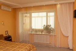 Bedroom with balcony door photo