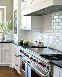 White tiles on the kitchen wall photo